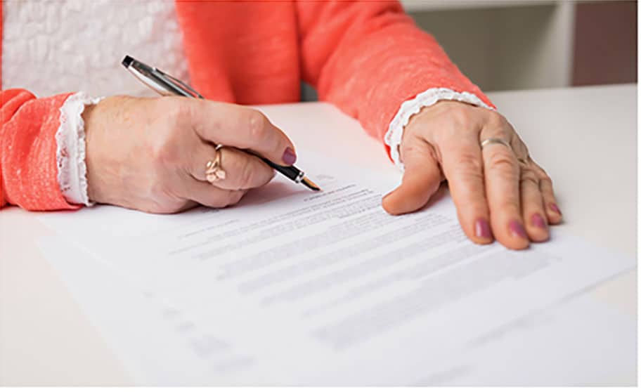 estate planning client signing legal documents