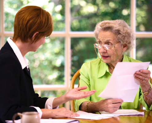 michigan elder law attorney with client discussing durable power of attorney